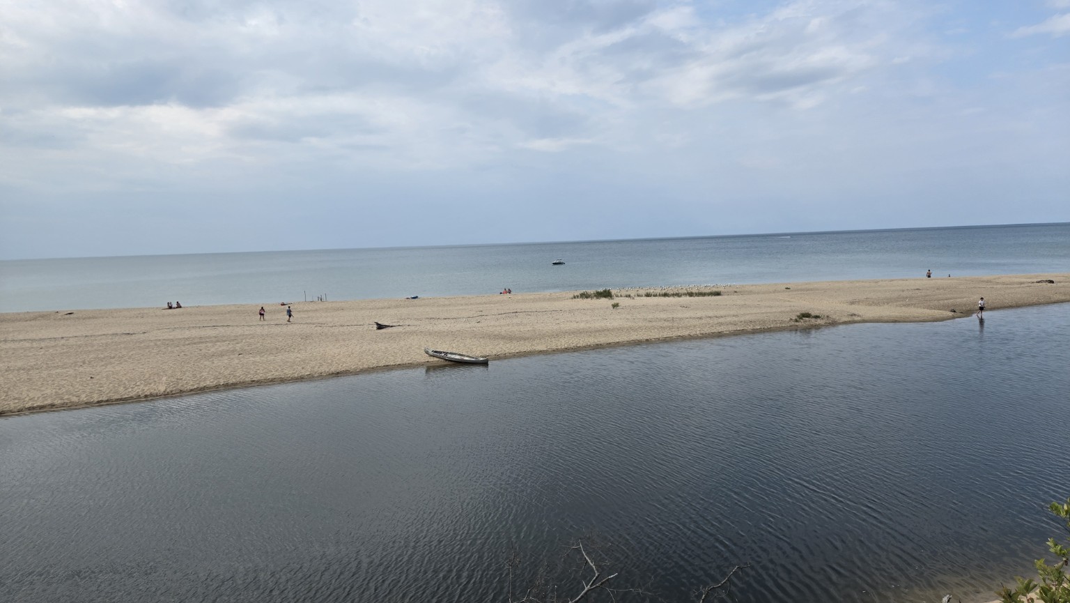 Wide sandy beach and Lake Huron at the end of the paddle